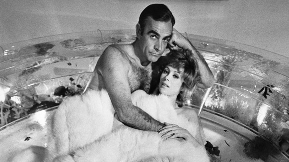 British actor Sean Connery as 007 secret agent James Bond in the bath with Bond girl Tiffany Case, played by American actress Jill St John, in the 1971 film Diamonds Are Forever. (Photo by Terry O&#03 ...