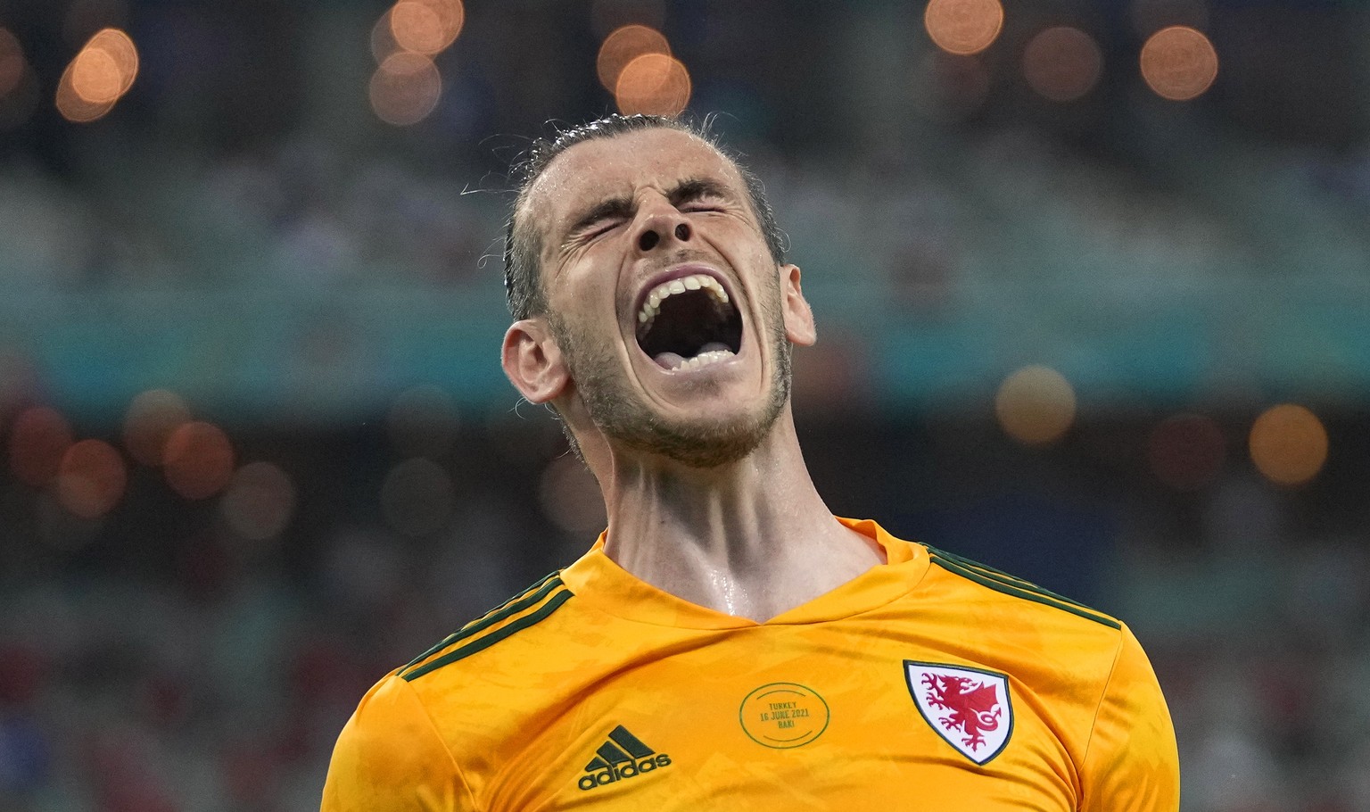 epa09277636 Gareth Bale of Wales celebrates his team&#039;s 2-0 lead during the UEFA EURO 2020 group A preliminary round soccer match between Turkey and Wales in Baku, Azerbaijan, 16 June 2021. EPA/Da ...