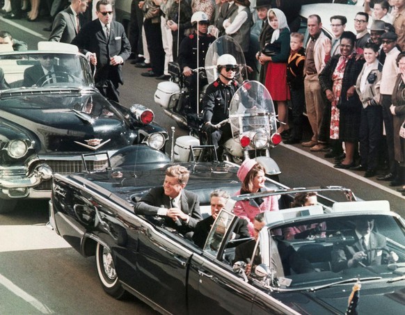 FILE - In this Nov. 22, 1963 file photo, President John F. Kennedy&#039;s motorcade travels through Dallas. (AP Photo/PRNewsFoto/Newseum, File) THIS CONTENT IS PROVIDED BY PRNewsfoto and is for EDITOR ...