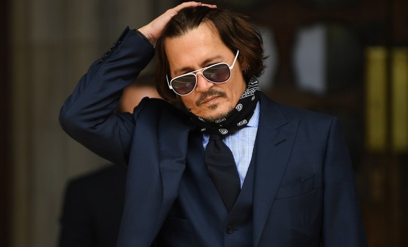 epa08792649 (FILE) - US actor Johnny Depp arrives at the Royal Courts of Justice in London, Britain, 14 July 2020 (reissued 02 November 2020). The UK High Court ruled against Depp in his libel trial a ...