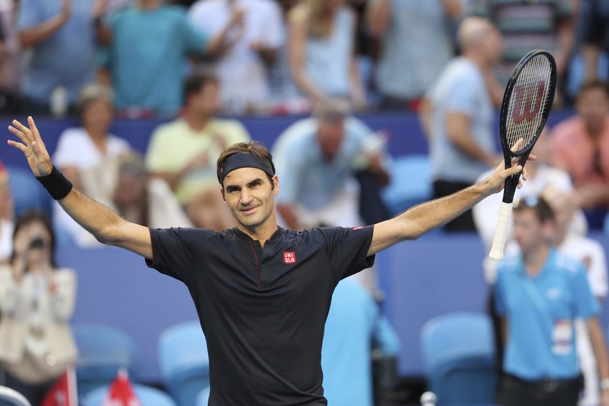 Switzerland&#039;s Roger Federer celebrates his win over Alexander Zverev of Germany in their final match at the Hopman Cup tennis tournament in Perth, Australia, Saturday Jan. 5, 2019. (AP Photo/Trev ...