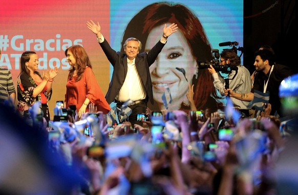 epaselect epa07955531 President-elect of Argentina Alberto Fernandez celebrates with his supporters after winning the first round of the Argentine general election, in Buenos Aires, Argentina, 27 Octo ...