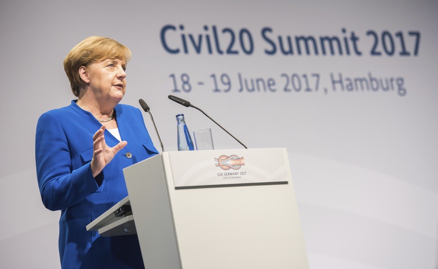 German chancellor Angela Merkel speaks at the C20 Summit in Hamburg, Germany, Monday, June 19, 2017. The &#039;Civil20&#039; (C20) conference brings together civil society organizations and NGOs from  ...
