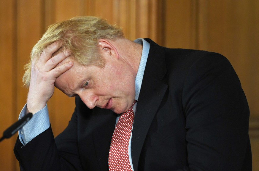 epa08326125 (FILE) British Prime Minister Boris Johnson speaks during a news conference inside 10 Downing Street in London, Britain, 12 March 2020 (reissued 27 March 2020). According to reports, Briti ...