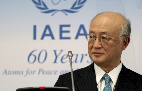 Director General of the International Atomic Energy Agency, IAEA, Yukiya Amano of Japan addresses the media during a news conference after a meeting of the IAEA board of governors at the International ...