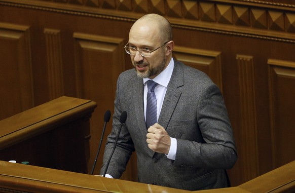 Ukraine&#039;s newly elected Prime Minister Denis Shmygal speaks at the parliament session hall in Kyiv, Ukraine, Wednesday, March 4, 2020. Lawmakers voted vice prime minister Smygal to be the country ...