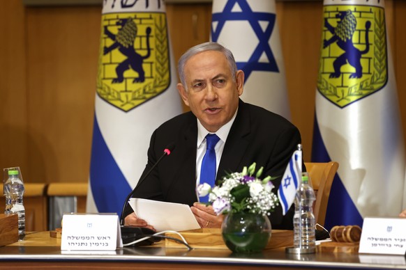 Israeli Prime Minister Benjamin Netanyahu attends a special cabinet meeting on the occasion of Jerusalem Day, at the Jerusalem Municipality building, in Jerusalem, Sunday, May 9, 2021. (Amit Shabi/Poo ...