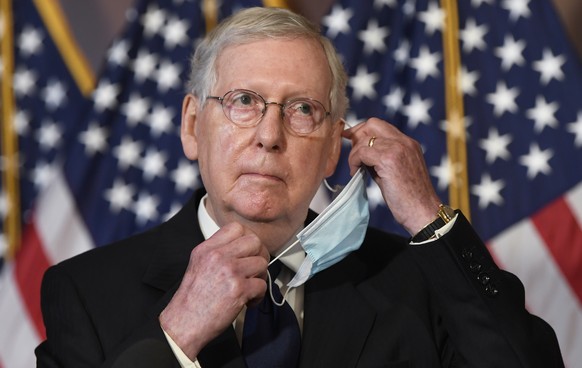 Senate Majority Leader Mitch McConnell of Ky., listens to a question during a news conference on Capitol Hill in Washington, Monday, July 27, 2020, to highlight the new Republican coronavirus aid pack ...