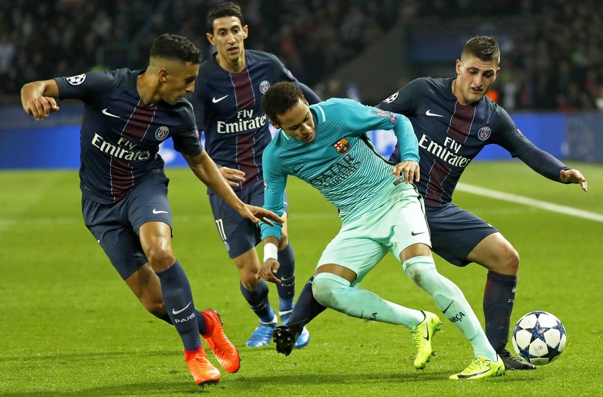 epa06121187 (FILE) - FC Barcelona&#039;s Neymar (C) vies for the ball against Paris Saint Germain&#039;s Presnel Kimpembe (L), Angel Di Maria (back), and Marco Verratti (R) during the UEFA Champions L ...