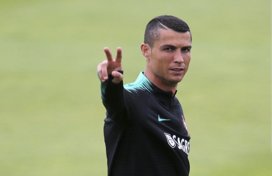 Portugal&#039;s Cristiano Ronaldo gestures during a team training session, in Oeiras, outside Lisbon, Monday, June 4 2018. (AP Photo/Armando Franca)