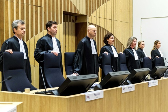 epa08280372 Judges arrive in the courtroom of the heavily secured Schiphol Judicial Complex (SJC), where the international MH17 trial started, in Badhoevedorp, The Netherlands, 09 March 2020. The Dist ...