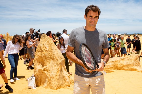 epa07249930 Swiss tennis player Roger Federer poses for a photo during a media event at the Pinnacles in Nambung National Park near Perth, Western Australia, 27 December 2018. Roger Federer will be pl ...