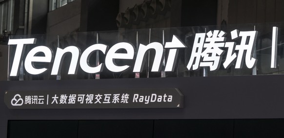epa08588891 (FILE) - The logo of Tencent Holdings Limited is displayed on the company&#039;s booth at Big Data expo in Guiyang, Guizhou Province, China, 28 May 2018 (reissued 07 August 2020). Accordin ...