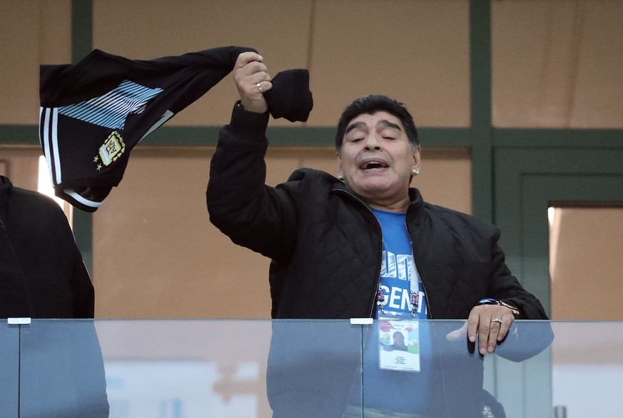 epa06828647 Argentinian soccer legend Diego Maradona reacts prior to the FIFA World Cup 2018 group D preliminary round soccer match between Argentina and Croatia in Nizhny Novgorod, Russia, 21 June 20 ...
