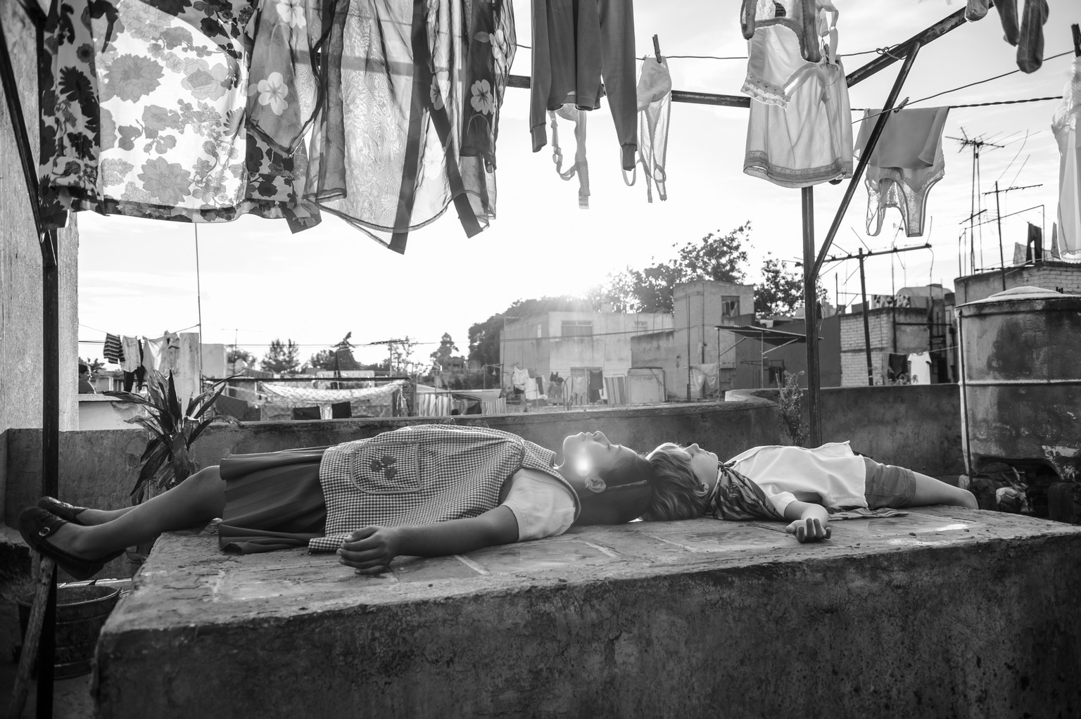 This image released by Netflix shows a scene from the film &quot;Roma,&quot; by filmmaker Alfonso Cuaron. (Netflix via AP)