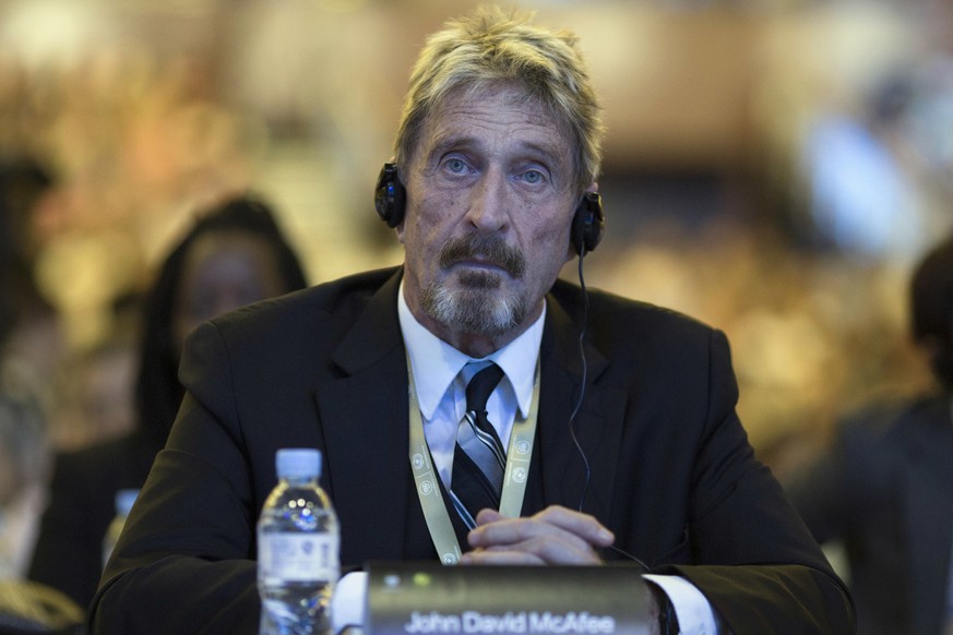 Founder of the first commercial anti-virus program that bore his name, John David McAfee listens during the 4th China Internet Security Conference (ISC) in Beijing, Tuesday, Aug. 16, 2016. Despite Chi ...