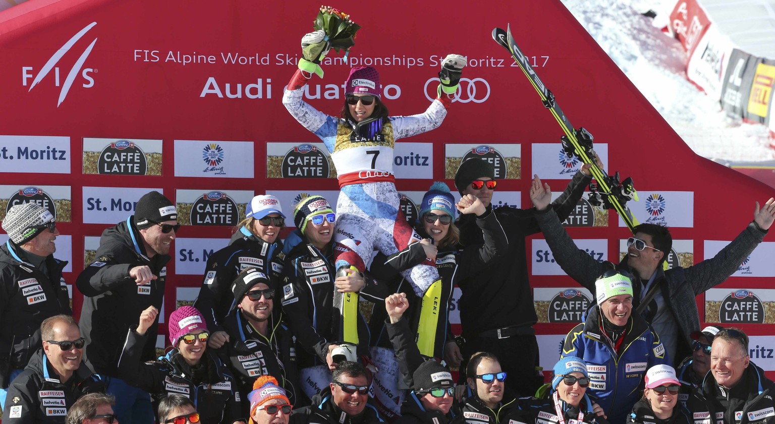 Alpine Skiing - FIS Alpine Skiing World Championships - Women&#039;s Slalom - St. Moritz, Switzerland - 18/2/17 - Silver medalist Wendy Holdener of Switzerland celebrates with the Swiss team after the ...