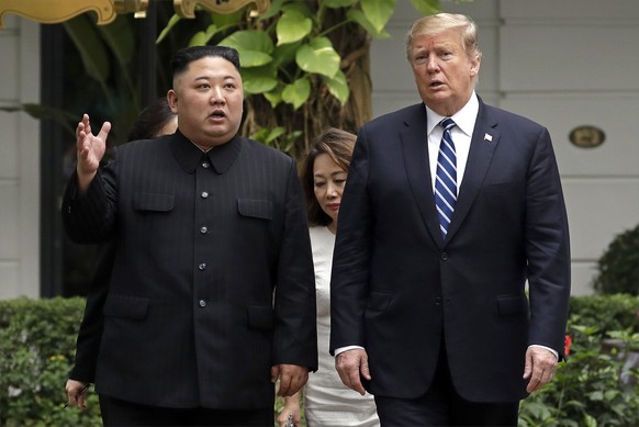 FILE - In this Feb. 28, 2019, file photo, U.S. President Donald Trump, right, and North Korean leader Kim Jong Un take a walk after their first meeting at the Sofitel Legend Metropole Hanoi hotel, in  ...
