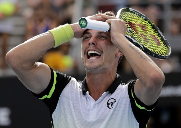 Hungary&#039;s Marton Fucsovics celebrates after defeating Argentina&#039;s Nicolas Kicker during their third round match at the Australian Open tennis championships in Melbourne, Australia, Saturday, ...