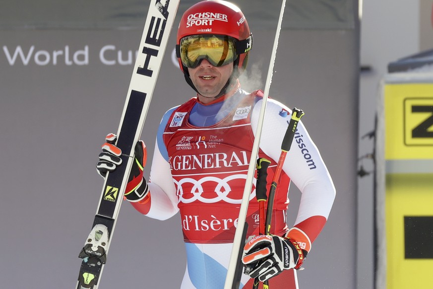 Switzerland&#039;s Beat Feuz gets to the finish area after completing an alpine ski, men&#039;s World Cup downhill, in Val d&#039;Isere, France, Sunday, Dec. 13, 2020. (AP Photo/Alessandro Trovati)