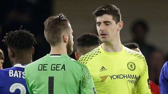 Rival goalkeepers Manchester United&#039;s David de Gea and Chelsea&#039;s Thibaut Courtois talk following their English FA Cup quarterfinal soccer at Stamford Bridge stadium in London, Monday, March  ...