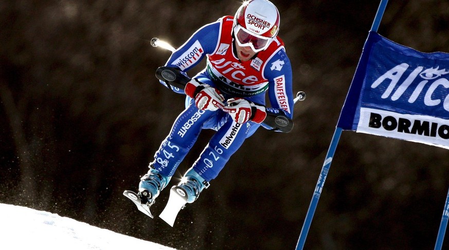 epa01283384 Switzerland&#039;s Didier Defago during his run in the men&#039;s alpine skiing World cup Grand Finals Super-G race, in Bormio Italy,13 March 2008. Defago finished in second place and Aust ...