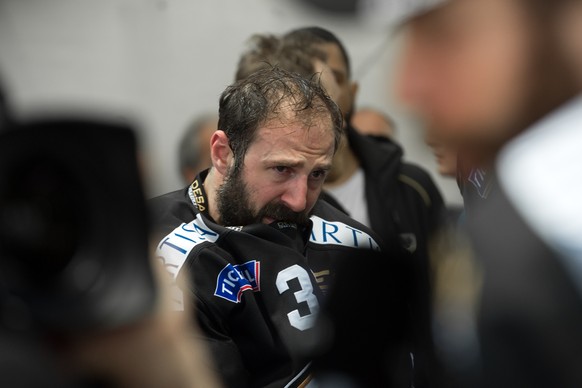 Lugano’s player Sebastien Reuille reacts after the seventh match of the playoff final of the National League of the ice hockey Swiss Championship between the HC Lugano and the ZSC Lions, at the ice st ...