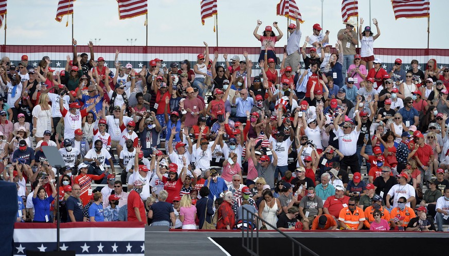 Central Floridians attend the campaign rally held by President Donald Trump in Sanford, Florida on Monday, October 12, 2020. This is the president s first rally since being diagnosed with Covid-19. PU ...