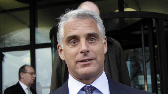 Chief Executive Officer of UBS, Andrea Orcel leaves Portcullis House in London after giving evidence on banking standards to the Parliamentary Commission on Banking Standards, Wednesday, Jan. 9, 2013. ...