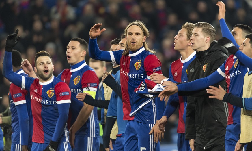 Basel&#039;s players cheeer with the fans after winning the UEFA Champions League Group stage Group A matchday 5 soccer match between Switzerland&#039;s FC Basel 1893 and England&#039;s Manchester Uni ...