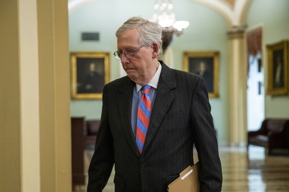 epa09231372 Senate Minority Leader Mitch McConnell walks to the Senate floor to deliver remarks in the US Capitol in Washington, DC, USA, 27 May 2021. Leader McConnell has said he opposes the creation ...