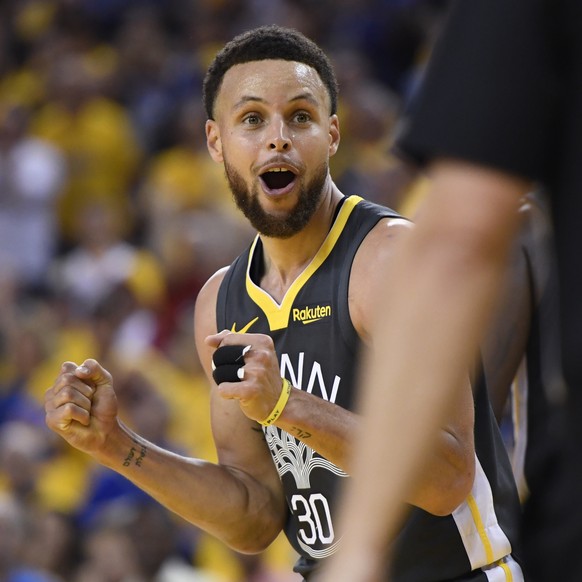Golden State Warriors guard Stephen Curry reacts to a foul on Toronto Raptors guard Fred VanVleet during the second half of Game 6 in basketball’s NBA Finals, Thursday, June 13, 2019, in Oakland, Cali ...