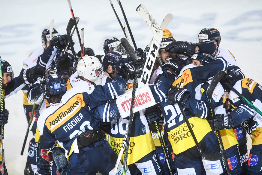 Ambri&#039;s players celebrate Michael Fora for scoring the 2-1 goal, during the preliminary round game of National League A (NLA) Swiss Championship between HC Ambri Piotta and ZSC Lions at the ice s ...