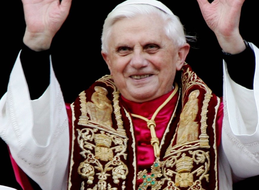 A photograph dated 19 April 2005 showing the newly elected Pope Benedict XVI as he greets pilgrims while standing on the balcony of Saint Peter&#039;s Basilica, in the Vatican, after his election. Car ...