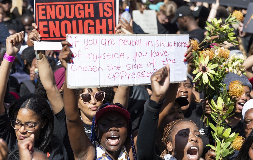 epa07819470 Tens of thousands protest outside parliament against gender based violence following a week of brutal murders of young South African women in Cape Town, South Africa, 05 September 2019. Th ...