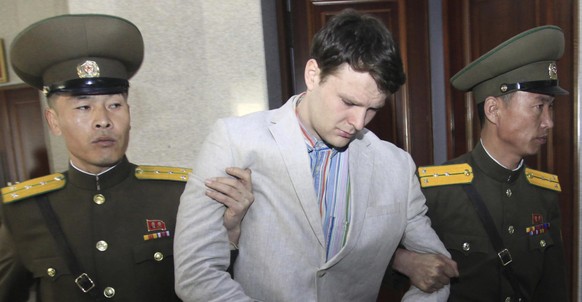 In this March 16, 2016, file photo, American student Otto Warmbier, center, is escorted at the Supreme Court in Pyongyang, North Korea. North Korea announced Warmbier&#039;s detention Jan. 22, 2016, a ...