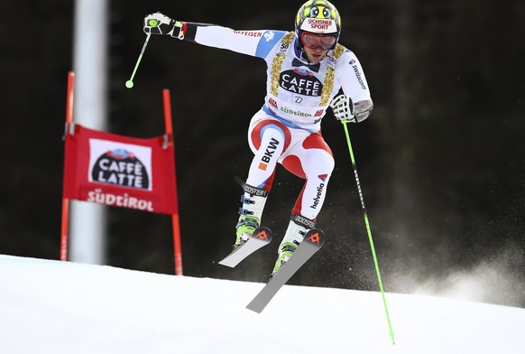 Switzerland&#039;s Justin Murisier competes during an alpine ski, men&#039;s World Cup giant slalom, in Alta Badia Italy, Sunday Dec. 18, 2016. (AP Photo/Alessandro Trovati)