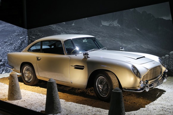 An Aston Martin DB5 from the James Bond film &quot;Goldfinger&quot; is displayed during a press presentation of the exhibition &quot;The Designing 007: Fifty Years of Bond Style&quot; at the Grande Ha ...