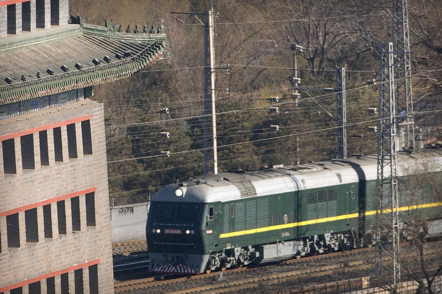 A train similar to one seen during previous visits by North Korean leader Kim Jong Un arrives at Beijing Railway Station in Beijing, Tuesday, Jan. 8, 2019. Kim is making a four-day trip to China, the  ...