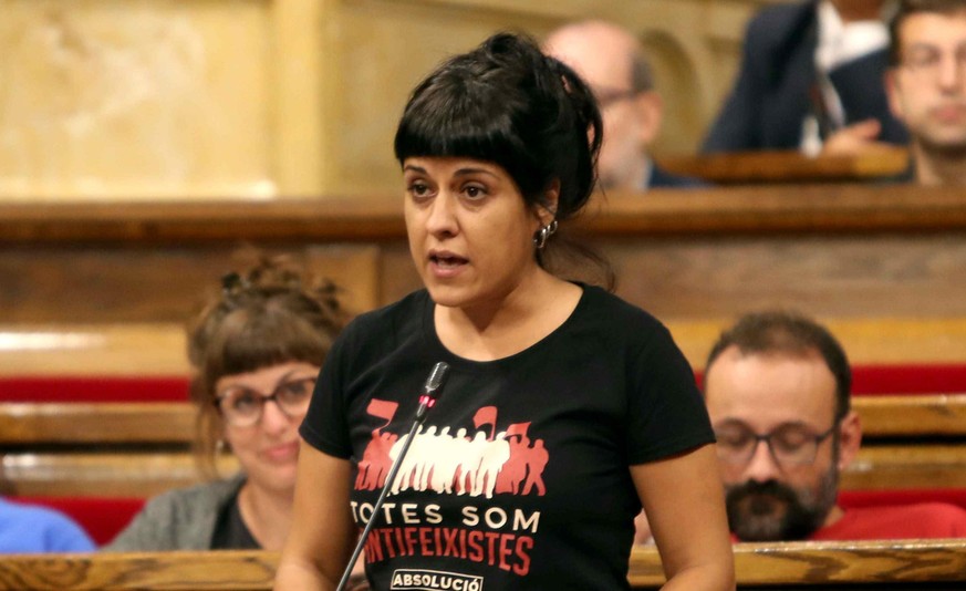 epa06187323 Pro-Catalan independence &#039;Popular Unity Candidacy&#039; (CUP) party Member of Parliament Anna Gabriel (standing) speaks during the plenary session at Catalonia&#039;s regional Parliam ...