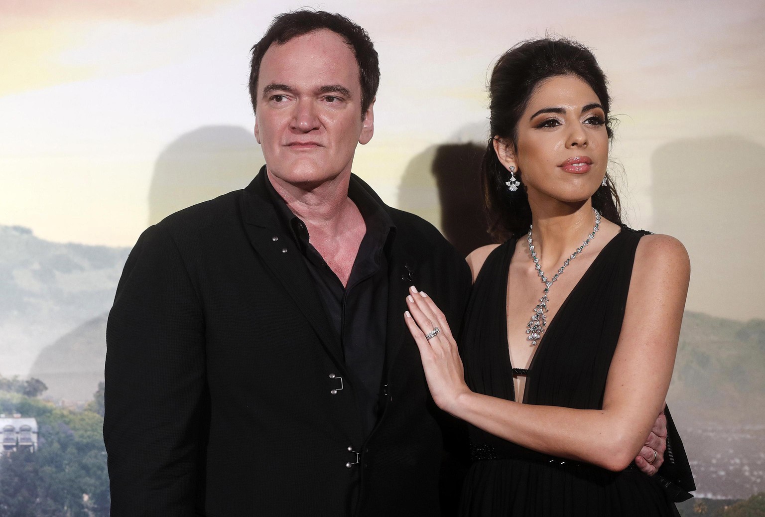 U.S. filmmaker Quentin Tarantino, left, with his wife Daniella Pick, right, attends the Italian Premiere and red carpet of the movie &quot;Once Upon A Time...in Hollywood,&quot; in Rome, Italy, Friday ...