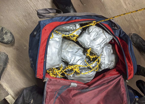 FILE - This undated photo provided on Jan. 24, 2020 by U.S. Customs and Border Protection shows some of over 165 pounds (75 kilograms) of suspected methamphetamine seized after smugglers tried to floa ...
