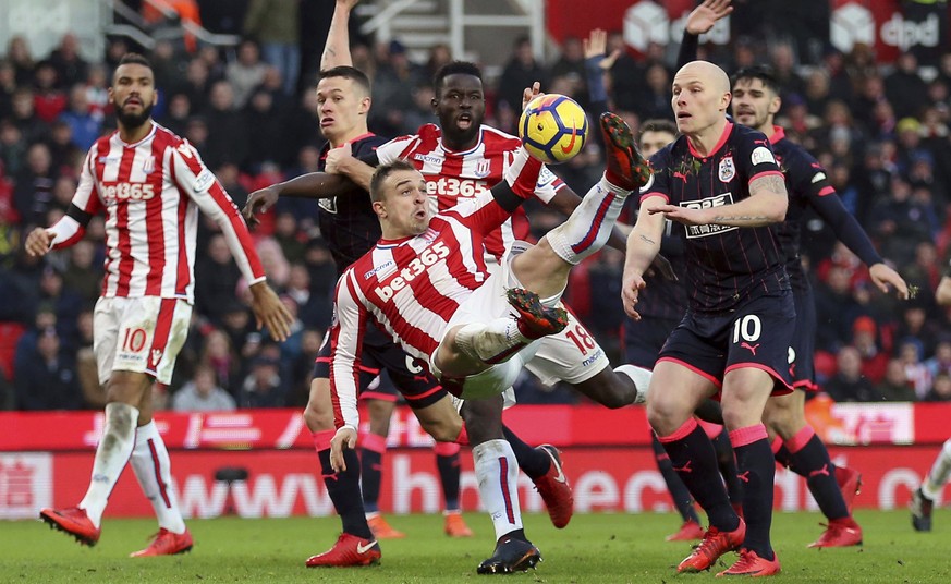 Stoke City&#039;s Xherdan Shaqiri has a shot and scores but has his goal against Huddersfield Town is disallowed during their English Premier League soccer match at the bet365 Stadium in Stoke, Englan ...
