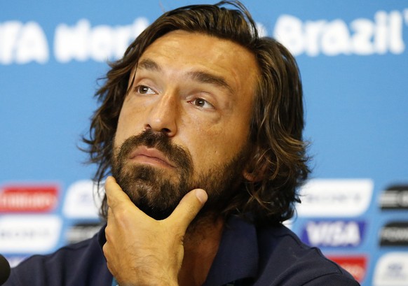 Italy&#039;s national soccer player Andrea Pirlo attends a news conference before their training session at the Dunas Arena soccer stadium in Natal June 23, 2014. Italy will face Uruguay on June 24. R ...
