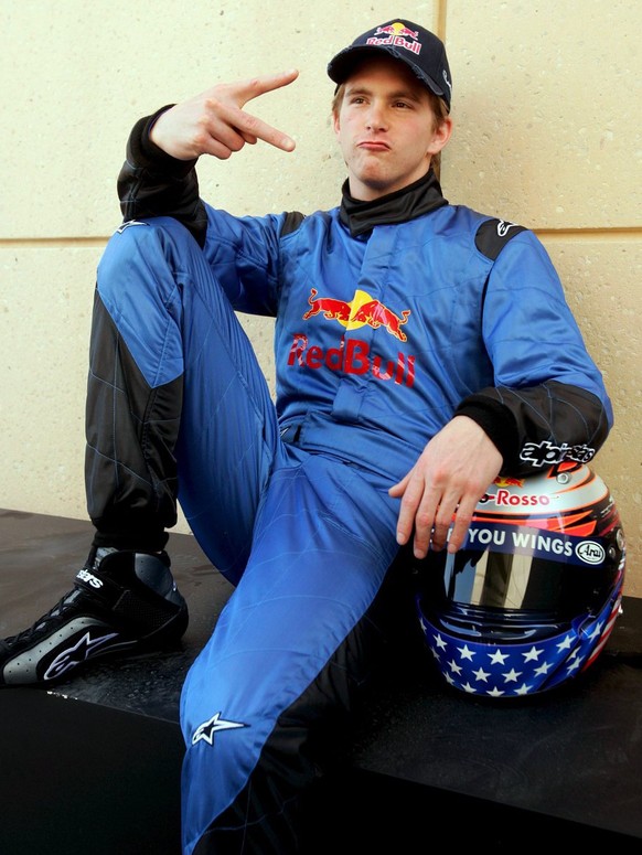 American Formula One driver Scott Speed of Scuderia Toro Rosso poses for photographers at the Bahrain Formula One race track near Manama, Thursday 09 March 2006. The first race of the F1 world champio ...