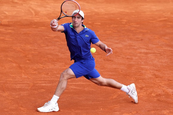 epa05913655 Pablo Cuevas of Uruguay returns the ball to Joao Sousa of Portugal during their first round match at the Monte-Carlo Rolex Masters tournament in Roquebrune Cap Martin, France, 18 April 201 ...