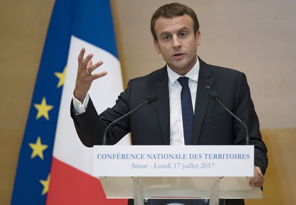 epa06092911 French President Emmanuel Macron delivers a speech during the local government conference dubbed &#039;National Conference of Territories&#039; held at the Senate in Paris, France, 17 July ...