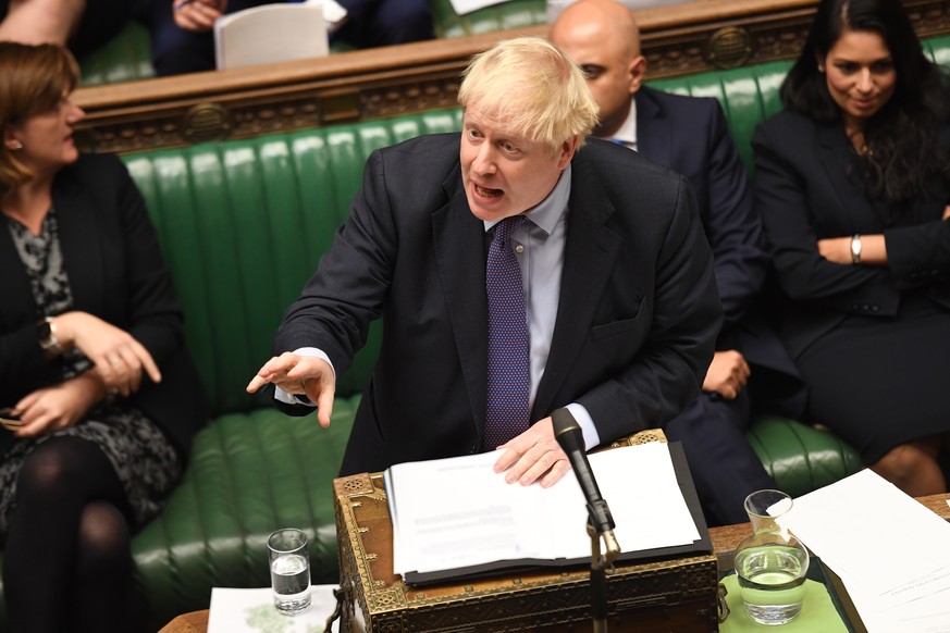 epa07940950 A handout picture made available by the UK Parliament shows British Prime Minister Boris Johnson speaking in the House of Commons in London, Britain, 22 October 2019. Johnson is urging MPs ...