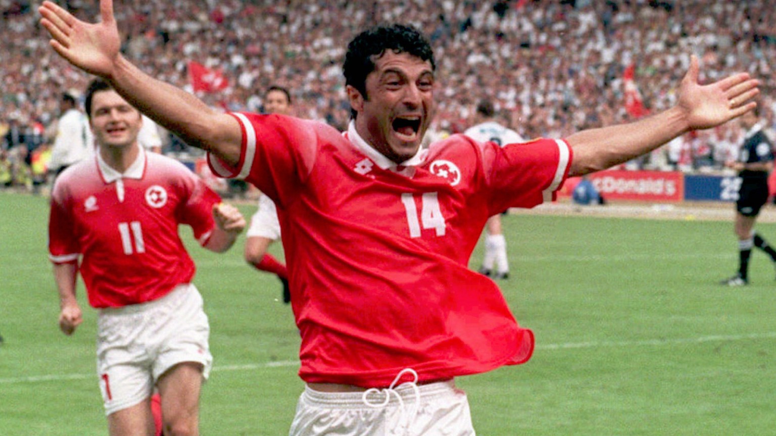 Switzerland&#039;s Kubilay Tuerkyilmaz celebrates after scoring from a penalty to equalize in the final minutes of the Saturday, June 8, 1996, opening Euro 96 Championship match against England, at We ...
