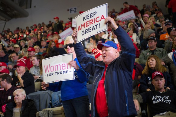 epa08174095 People attend a US President Donald J. Trump rally at the Wildwoods Convention Center in Wildwood, New Jersey, USA, 28 January 2020. Trump is holding the rally to show support for congress ...